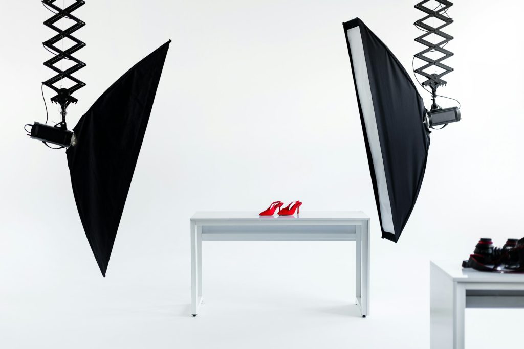 Professional photo shoot setup for red high heels